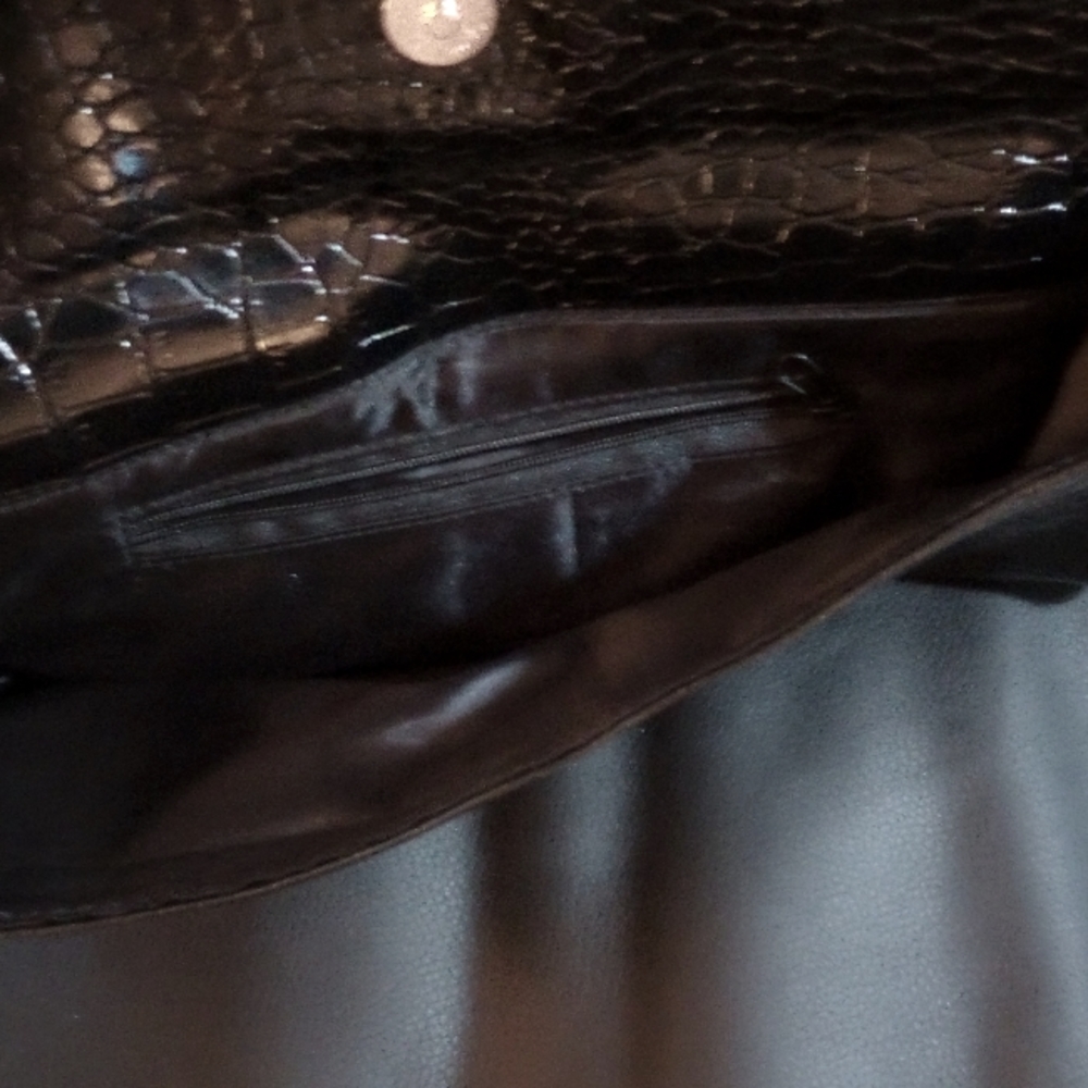 Small black snake print clutch bag